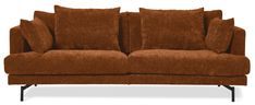 a brown couch sitting on top of a white floor