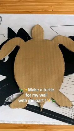 a cardboard cutout of a turtle with the words make a turtle for my wall with me part