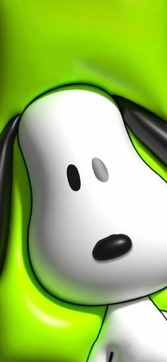 a cartoon dog with black and white ears sitting in front of a green background,