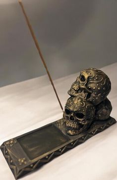 Elevate your incense-burning experience with this unique Gothic Skull Stack Incense Holder. Crafted from high-quality 3D printed materials, this eerie yet stylish incense holder features three intricately detailed skulls stacked atop each other, each facing a different direction for a dramatic, eye-catching effect. Designed to hold standard incense sticks, it includes a convenient built-in tray to catch ashes, keeping your space clean while you enjoy the calming or mystical ambiance created by your favorite scents. Perfect for lovers of gothic décor, skull collectors, or anyone looking to add a spooky, artistic touch to their home or sacred space. Ideal for use during meditation, relaxation, or Halloween! Perfect for: Homes, altars, meditation spaces, or gifts for skull enthusiasts Skulls Stacked, Incense Burning, Meditation Relaxation, Gothic Skull, Gothic Decor, Incense Holders, Favorite Scents, Incense Sticks, Incense Holder