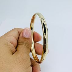 Real 10k Gold Bracelet Bangle Bracelet Polished 6mm Wide Approx 65mm Or 2.5 Inch Diameter Considered A Medium Size Yellow Polished Gold New Jewelry Brazalete En Oro De 10 Kilates 6mm De Ancho Aproximadamente 2.5 Pulgadas O 65 Milmetros De Dimetro Brazalete Oro Pulido Pulsera De Mujer Sku 44277 Classic Tarnish Resistant Round Bangle, Classic Tarnish-resistant Round Bangle, Gold Oval Bracelet Stamped 14k, 14k Yellow Gold Bracelets With Shiny Finish, 14k Gold Yellow Gold Bracelets With Shiny Finish, Yellow Gold Bracelet With Shiny Finish For Anniversary, Flexible 14k Yellow Gold Bangle, Hoop Yellow Gold Bracelet For Anniversary, Yellow Gold Hoop Bracelet For Anniversary