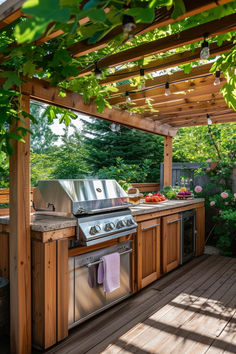 an outdoor kitchen with grill and sink under a pergolated roof