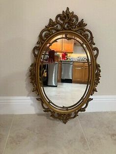 Vintage Gold Oval Mirror SYROCO ornate scroll wall art mid century modern 60s. Condition is Used. Shipped with USPS Ground Advantage. Vintage Bathroom Mirror, Vintage Wood Mirror, Kitchen Mirrors, Gold Oval Mirror, Vintage Bathroom Mirrors, Vintage Vanity Mirror, Standing Mirrors, Scroll Wall Art, Art Mid Century Modern