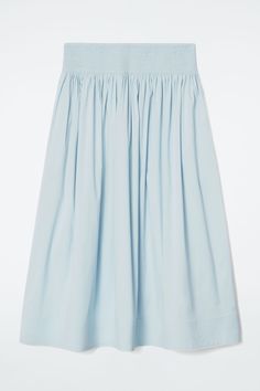 Voluminous silhouettes animate the COS womenswear collection this season. Crafted from an airy cotton blend, this sky-blue skirt is artfully smocked at the waistband and cut in an A-line midi shape. Regular fitElasticated waistband Shell: 75% Cotton, 22% Polyamide, 3% Elastane. Excluding trims / Machine wash Back length of size 6 is 30.39" / Model wears a size 6 Belted Cape, Women Magazines, Blue Skirt, Denim Coat, Denim Outfit, Trouser Jeans, Hat Hairstyles, Playsuit Jumpsuit, Blouse And Skirt