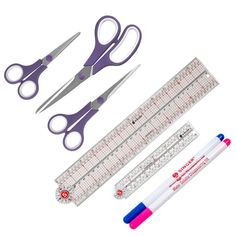 scissors, ruler and pen with markers on white background