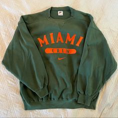 Vintage Miami Crew Nike Crewneck Size Xl Perfect Oversized Fit Good Quality Thicker Sweatshirt Material In Great Condition, Only Small Mark On Front That Is Not Noticeable And Could Probably Be Fixed With Proper Care Extremely Rare Find Green Nike Crewneck, Green Nike Vintage Sweatshirt, Crew Neck Sweatshirt Nike Vintage, 90s Retro Sweatshirts Nike, Vintage Green Crew Neck Sweatshirt, Nike Crewneck, Nike Sweatshirts, Nike Shirts, Vintage Nike