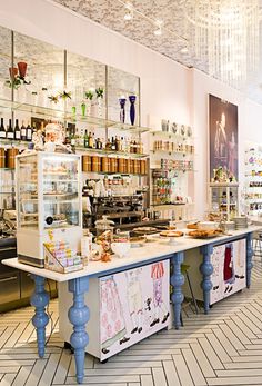 the inside of a restaurant with many items on display