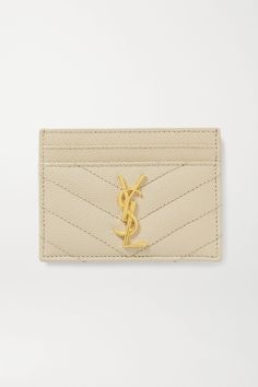 SAINT LAURENT's cardholder is part of the brand's 'Monogramme' collection, identifiable by its quilted designs and 'YSL' logo hardware. Made in Italy from textured-leather, it has four slots for your most-used cards and a pocket for folded bills or receipts. Chanel Card Holder Beige, Luxury Formal Card Holder With Embossed Logo, Designer Leather Card Holder With Embossed Logo, Designer Leather Card Holder With Logo, Designer Rectangular Wallets With Gold-tone Logo Plaque, Designer Gold Rectangular Card Holder, Designer Beige Card Holder With Card Slots, Luxury Leather Beige Card Holder, Designer Quilted Leather Wallet