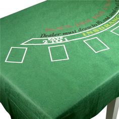 a green table with white numbers on it