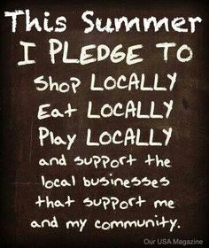 a blackboard with white writing on it that says, i pledge to shop locally eat locally and support the local businesses