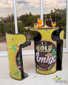 two beer coolers sitting next to each other in front of a window with drinks on it