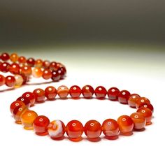 Carnelian Beaded Bracelet You will receive 1 (ONE) Carnelian Beaded Bracelet similar to the item pictured Available in 6mm 8mm 10mm FOLLOW US ON INSTAGRAM @earthsmineralsinc Thank you ! Pictures and colors Please note that visual representation of our products, especially colors, may appear a little different due to lighting in the photographic process. Shopper's computer screens may also affect appearance and colors. If a product is received that appears different from the item ordered, please Creativity Motivation, Mineral Jewelry, Carnelian Bracelet, Carnelian Crystal, Carnelian Pendant, Boost Creativity, Carnelian Beads, Crystal Beads Bracelet, Protection Bracelet