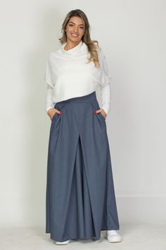 We present to you a unique Japanese-style long skirt that combines elegance and comfort. With a high waist and side pockets, this skirt is the perfect choice for modern life. Fastens easily and stylishly with a hidden zip. Made from high-quality viscose, it offers incredible softness and lightness. The front and back drapery add a unique Japanese accent that makes this skirt incomparable. This model comes in a variety of trendy colors, but our pick right now is the beautiful blue denim. This long skirt is not only stylish, but also accentuates the beauty of every figure, thanks to its specially designed cut. Combining elegance and practicality, it is suitable for wearing in any season. Regardless of the occasion, this skirt will make you extremely stylish and confident. ● The model is 5'9″ Casual Street Wear, Draped Skirt, Velvet Skirt, Winter Skirt, Style Japonais, Japanese Style, Skirts With Pockets, Trendy Colors, Long Skirt