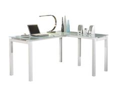 a glass desk with a laptop on it