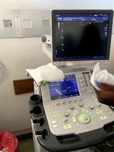 a person operating a medical machine in a room