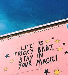 a pink sign with writing on it that says life is tricky baby, stay in your magic