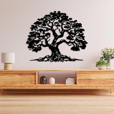 a large tree wall decal on the side of a wooden table in a living room