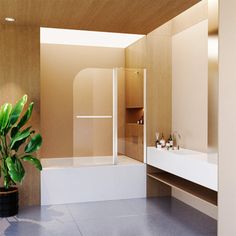 a bathroom with a plant in the corner