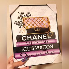 a person holding up a sign that says, chanel valentine's vuitton dream is real