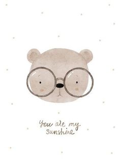 a white bear wearing glasses with the words you are my sunshine on it