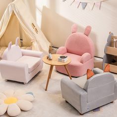 the children's room is decorated in pastel colors and has bunny ears on it