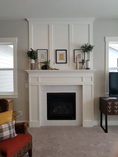 a living room filled with furniture and a fire place