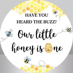 a round sign that says, have you heard the buzz? our little honey is me