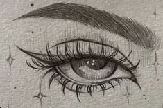 a drawing of an eye with long lashes and stars on the wall in the background