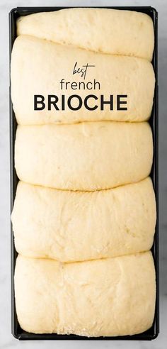 four pieces of bread in a black box on a white counter top with the words best french brioche