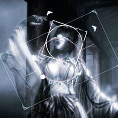 a woman holding her hands up in front of an abstract image with circles and lines