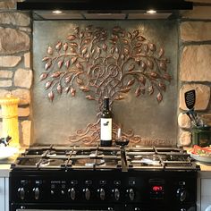 Kitchen Backsplash Celtic Tree of Life Forest Green And Copper Kitchen, Copper Stove Backsplash, Copper Hood Kitchen, Stone Backsplash Kitchen Rustic, Tin Tile Backsplash Kitchen, Backsplash Behind Stove Only, Back Splashback Kitchen Ideas, Copper Backsplash Kitchen, Tuscan Kitchen Ideas Rustic Italian