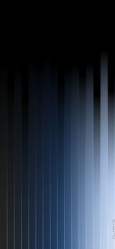 an abstract blue and black background with vertical lines