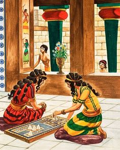 two women are sitting on the floor playing checkers in front of an egyptian temple