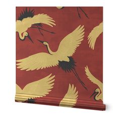 a red wallpaper with yellow and black birds on it's back side,