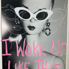 a poster with the words i woke up like this in pink and black on it