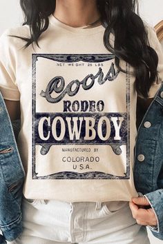 Coors Rodeo Cowboy Graphic Tee.Unisex Crew Neck Short Sleeve Tees.Crafted from premium materials, tailored to your lifestyle, ensuring a comfortable fit for any occasion.Family Group Uniforms Birthday Party Gift Concert Festival Events.High Quality Direct To Film Printed Graphic Design.100%COTTON,HEATHER(52%COTTON,48%POLY),ATH.HEATHER,BLACK HEATHER(90%COTTON,10%POLY)NICARAGUAMade In: Nicaragua Coors Rodeo, Autumn Kelly, Cowboy Graphic, Rodeo Cowboy, Concert Festival, Film Prints, Birthday Party Gift, Graphic Design Print, Heather Black