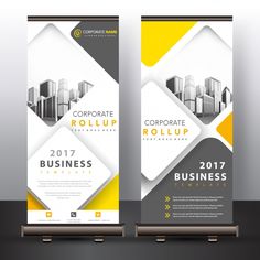 a roll up banner with yellow and gray shapes