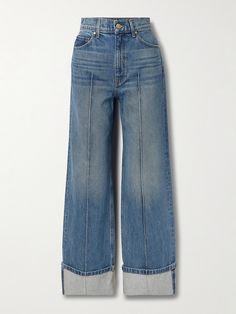 Ulla Johnson's 'The Genevieve' jeans have been handcrafted with smart details like raised seams and rolled cuffs. They're cut from faded blue denim in a wide-leg shape. Tuck one of the label's feminine blouses into the high-rise waistband. High Rise Wide Leg Jeans, Buy List, Feminine Blouses, Cardigan Shirt, Fashion Board, Guilty Pleasures, Spring 2023, Wide Legs, Wide Leg Denim