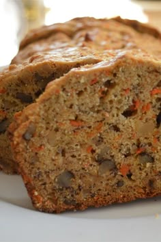 two slices of carrot bread on a white plate