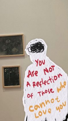 a piece of paper that has been cut out to look like a person with the words you are not a reflection of those who cannot love you