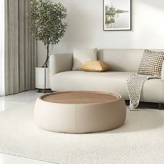 A sleek and minimalist storage coffee table EXCEEB Table Base Color: Light Coffee Color, Size: 14.17" H x 45.66" L x 45.66" W | EXCEEB Modern simple coffee table Nordic storage 14.17 H x 45.66 W x 45.66 D in brownWood in Light Coffee Color | 14.17" H x 45.66" L x 45.66" W | Wayfair White Oak Coffee Table, Minimalist Storage, Family Friendly Living Room, Minimalist Coffee Table, Storage Coffee Table, Coffee Table Size, Simple Coffee Table, Storage Wood, Oak Coffee Table