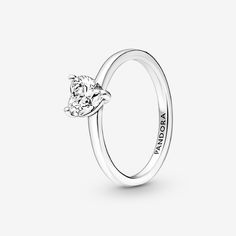 The latest addition to our solitaire collection, the Sparkling Heart Solitaire Ring features a heart-shaped clear cubic zirconia as the centerpiece. The Pandora logo is engraved on the inside of the polished shank. Stack this ring with other sterling silver pieces for a monochromatic look or mix metal finishes to make a unique statement. - Pandora Sparkling Heart Solitaire Ring - Sterling silver / Cubic Zirconia / Clear - Sz. 9 Pandora Stackable Rings, Heart Solitaire Ring, Pandora Logo, Small Heart, Silver Pieces, Halo Rings, Wide Bands, Metal Finishes, Stackable Rings