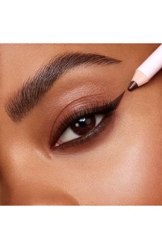 What it is: An ultracreamy eye pencil that lets you create ultradefined eyeliner looks. What it does: Its ultragliding formula delivers perfect one-stroke application with extreme intensity and long-lasting wear.Research results:In a consumer acceptance test on 50 women between 18–40 years after one week of use:- 100% agreed the texture was ultracreamy- 100% agreed the texture delivered ultra glide- 100% agreed it delivered intense color in just one stroke- 96% agreed it stayed on for 12 hours o Best Gel Eyeliner Pencil, Brown Eyeliner Brown Eyes, Eyeliner Brown Eyes, Brown Eyeliner Pencil, Routine Tips, Beauty Routine Tips, Brown Eyeliner, School Makeup, Soft Autumn