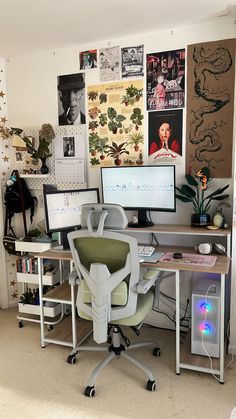 a computer desk with two monitors on top of it