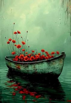 a boat filled with red flowers floating on top of water