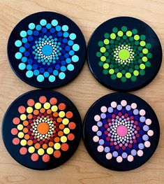 Add a touch of boho chic to your home with these hand painted wood coasters. Each coaster features a beautiful mandala dot art design, perfect for adding a pop of color to your coffee table or bar cart. This set includes 4 coasters, each measuring 3 inches in diameter. The coasters also come with pads underneath to protect your furniture from scratches and spills. These versatile coasters can be used with drink ware to protect your surfaces from condensation, or used as stylish candle holders to Coaster Mandala Art, Mandala Coasters Painted, Dot Mandala Coasters, Dot Mandala Patterns Simple, Coaster Design Ideas, Spring Pots, Mandala Coasters, Painted Coasters, Paint And Drink