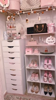 a closet filled with lots of pink shoes and bags on top of it's shelves