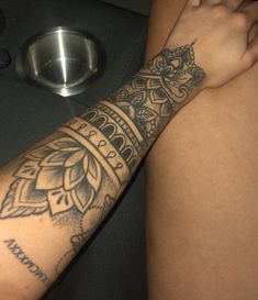 a person with a tattoo on their arm