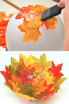 a bowl with leaves painted on it and a person using a knife to cut out the leaves