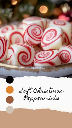 a plate full of christmas peppermints on top of a table